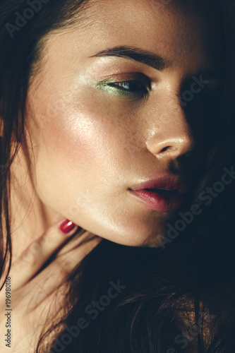 Fashion Profile Portrait Of A Sexy Brunette Women With Green