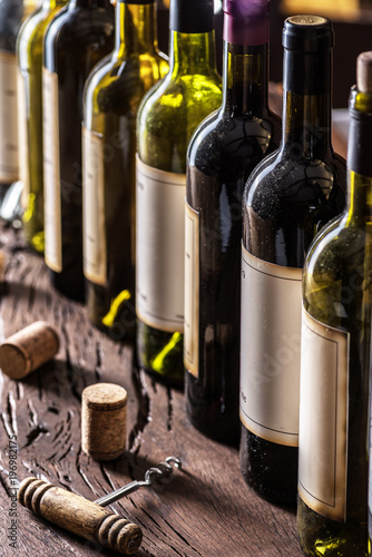 Cuadros en Lienzo Line of wine bottles. Close-up.