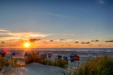 Sticker - Sonnenuntergang am Strand auf der ostfriesischen Nordseeinsel Juist in Deutschland, Europa.