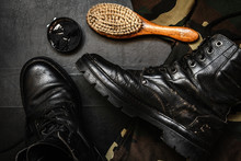 Men's Military Boots Rme Shoes, Brush And Shoe Polish Against A Dark Background Flat Lay Top View