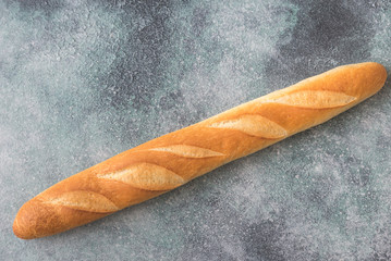 Canvas Print - Baguette on the wooden background