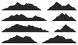 Mountains silhouettes on the white background. Vector set of outdoor design elements.
