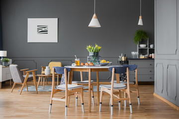 Table in grey room interior