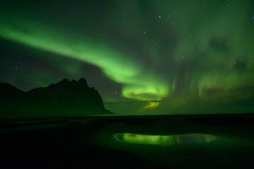 northern lights at stokksnes in iceland