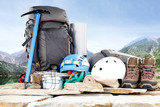 Fototapeta  - backpack and mountains 