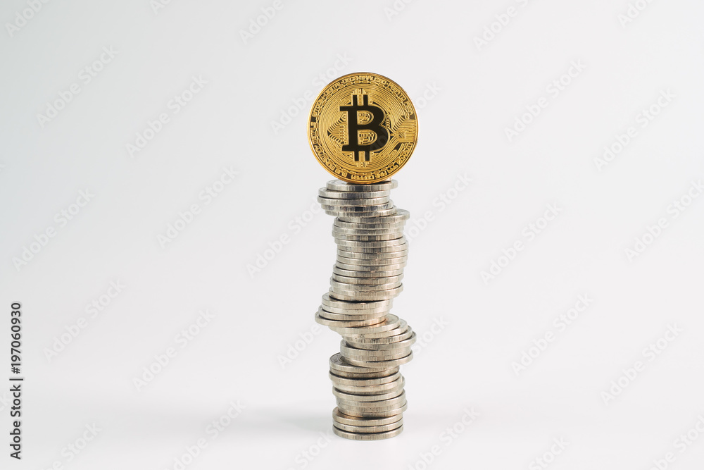 Golden bitcoin on top of coins stack, unstable of cryptocurrency exchange rate concept, risky invesment