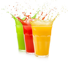 Wall Mural - set of fruit juice glasses splashing isolated on white