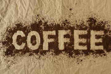 Coffee word written on to powdered coffee