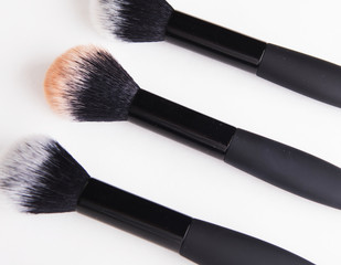 make up brush powder blushers on white background