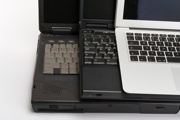 comparing of laptops, new modern and old laptops,