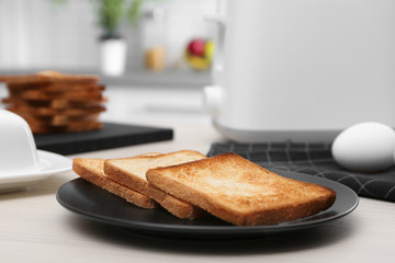 Wall Mural - Plate with toasted bread on table