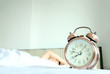 © Photo Sesaon - Morning holiday of a new day, alarm clock man sleep the room . Health concept.