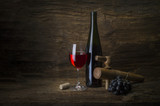 Fototapeta  - still life with red wine on old wood