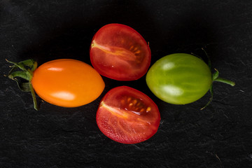 orange red and green tomatoes