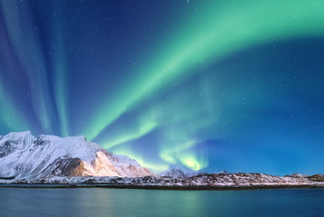 Wall Mural - northen light under mountains. beautiful natural landscape in the norway