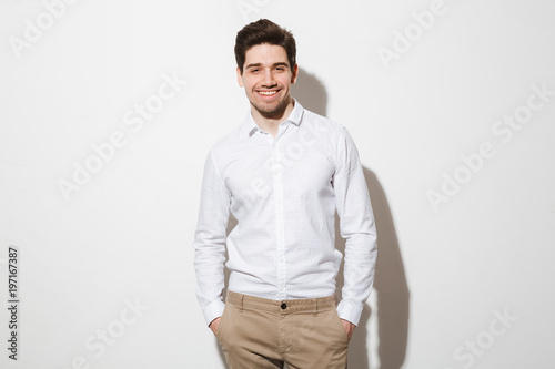 Cuadros en Lienzo Portrait of a smiling young man dressed in shirt