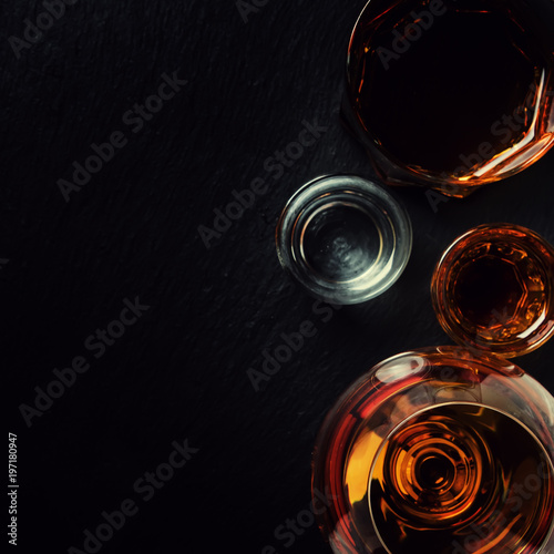 Fotografie, Obraz Selection of strong alcoholic drinks in glasses, top view