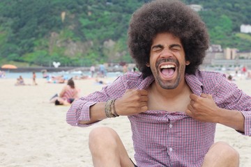 Wall Mural - Afro man on the beach