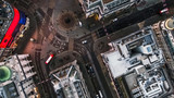 Fototapeta Londyn - Bird's Eye View Flying Over Piccadilly Circus and Aerial View of London City Streets at Night in London England 4K