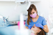 © pikselstock - Dentist and patient in dentist office