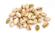 Group Of Green Pistachios And Their Husks