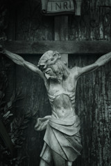 Wall Mural - crucifixion of Jesus Christ as a symbol of resurrection and immortality of the human soul (old wooden statue)