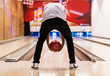 © Rawpixel.com - Boy bowling with two hands