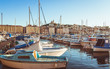 View on boats moored at sunset in Old Port of Marseille, Provence, France