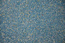 Texture Of A Colored Granular Sand Close Up. Blue Grains