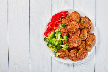 Wall Mural - juicy chicken broccoli meatballs on plate