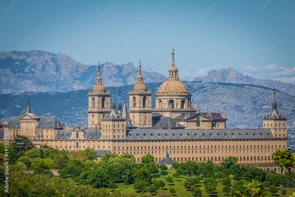 The Royal Seat of San Lorenzo de El Escorial, historical residence of the King of Spain, about 45 kilometres northwest Madrid, in Spain. - obrazy, fototapety, plakaty 