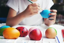 Easter Concept, Kid Painting Fancy Colorful Eggs For Easter Event