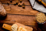 Fototapeta Mapy - bakery concept with homemade bread on rustic background top view