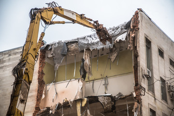 building demolition with hydraulic crashers
