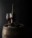 Fototapeta  - still life with red wine on dark background