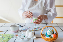 Woman Decorating Eggs With Decoupage Technique  