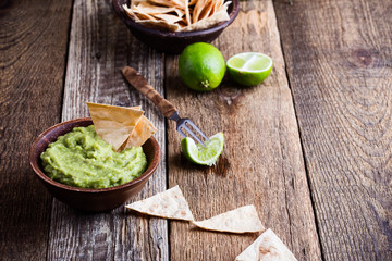 Poster - Fresh guacamole dip with lime juice and handmade nachos