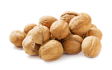 Wall Mural - heap of walnuts isolated on white background