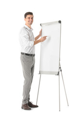 Canvas Print - Business trainer giving presentation on flip chart board against white background