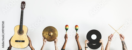 Fotografia Hands holding music instruments