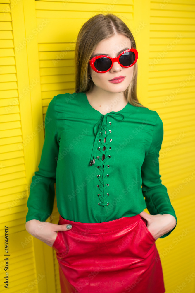 yellow top and red skirt