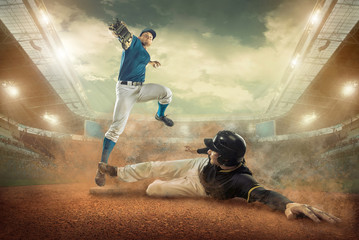 Wall Mural - Baseball players in action on the stadium.