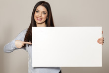Happy Woman Showing Empty Blank Paper Card Sign With Copy Space For Text