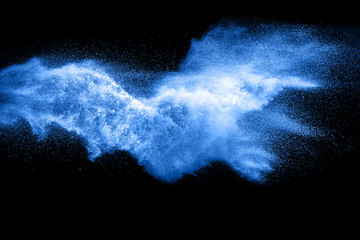 Wall Mural - blue particles splash on black background