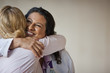 © Erickson Stock - Doctor hugging patient who has received good news.