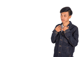 A handsome Asian man in black clothes standing in Studio white background