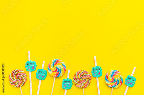 Download Birthday Party Background Lollipop And Decoration On Yellow Top View Mockup Stock Photo Adobe Stock