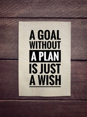 Motivational and inspirational quotes - A goal without a plan is just a wish. With vintage styled background.