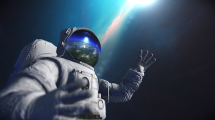 astronaut in outer space against the backdrop of the planet earth. elements of this image furnished 