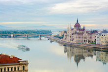 Quite Danube River, Floating Cruise Ship, Parliament Building. Budapest, Hungary
